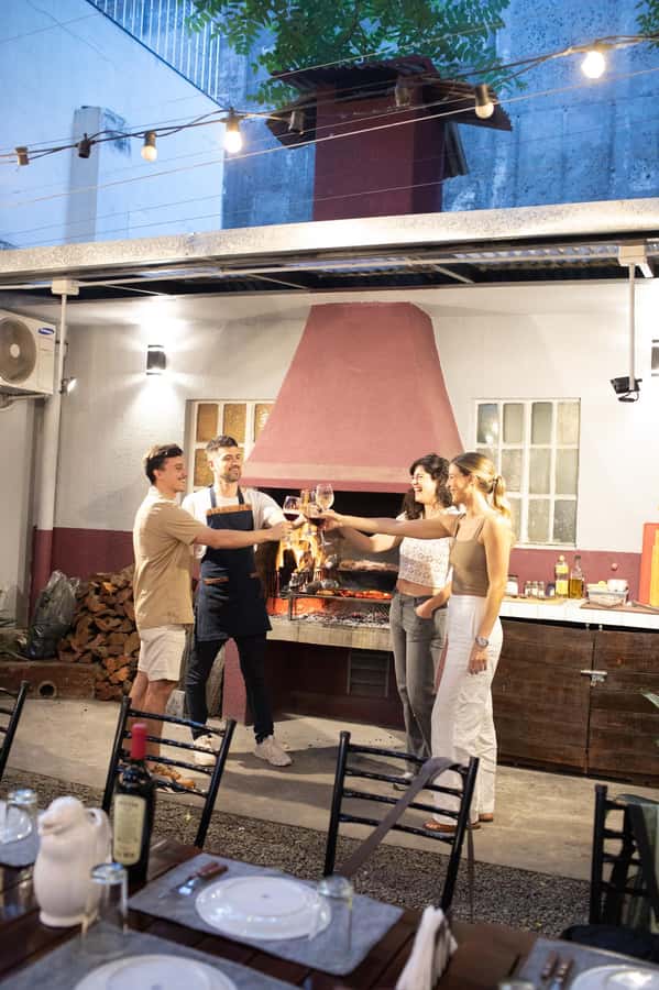 Buenos Aires: Authentic Argentine Asado BBQ with Live Music - Arriving at a welcoming local table