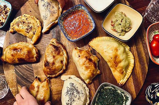 Buenos Aires Food Tour: Local Dishes, Steak, Empanada & More - Fire-grilled parrillada with chimichurri