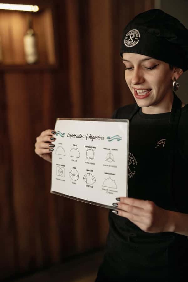 Iguazu Falls: The Argentine Experience Interactive Dinner - Folding empanadas with different repulga techniques