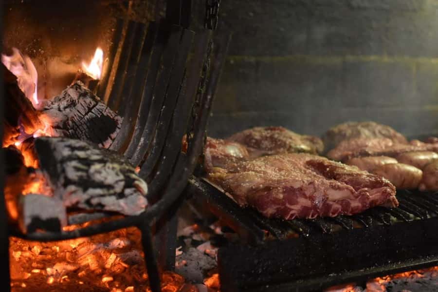 Secrets of Asado in Buenos Asado, BBQ and Dinner - Short ribs and sirloin over the open fire