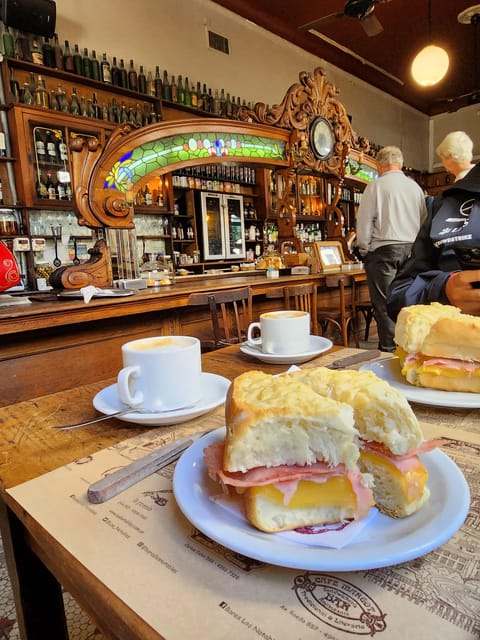 Walking Tour of San Telmo and La Boca with local food - Caminito, vendors, and choripan